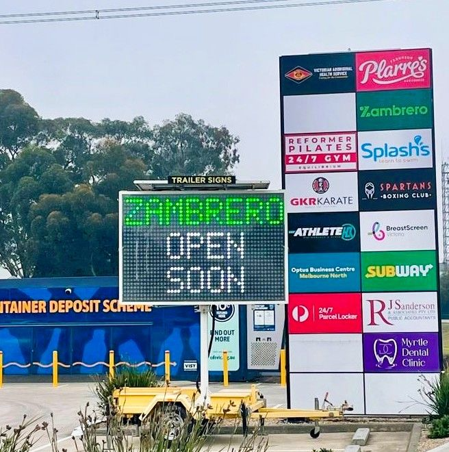 5-colour VMS trailer sign outside Zambrero on Plenty Road in South Morang advertising “Zambrero open soon” in brand colours