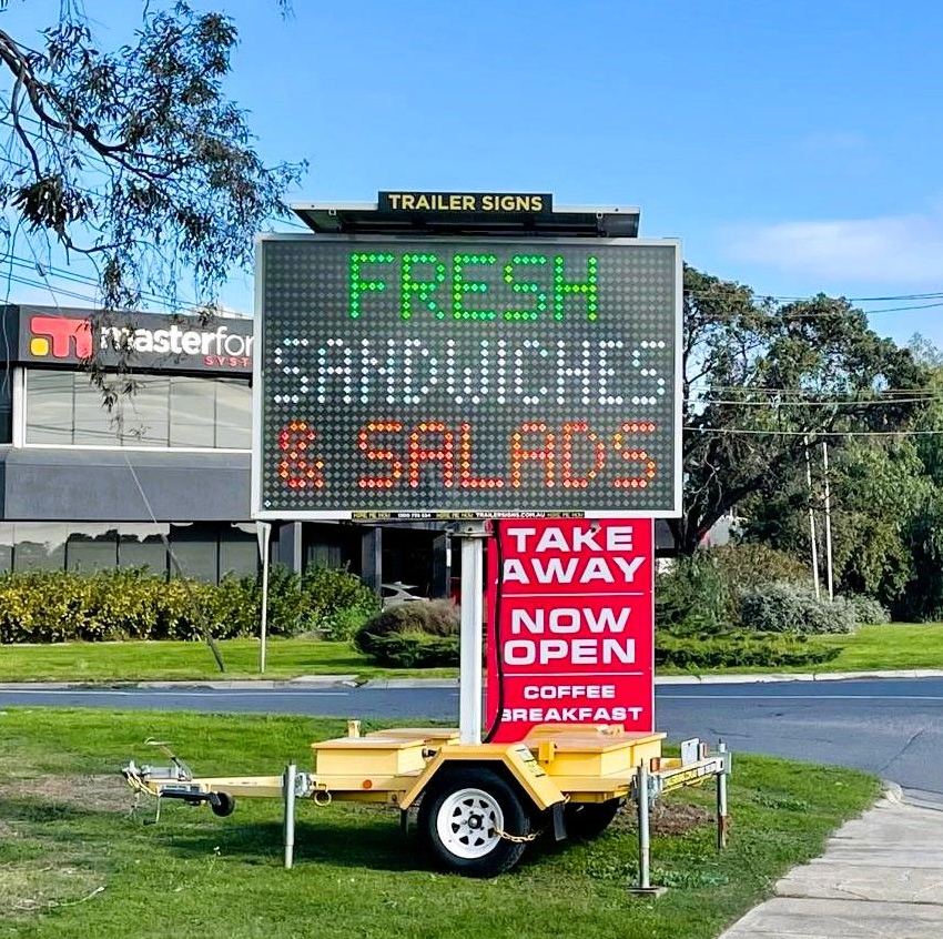 5-colour VMS trailer sign advertising “Fresh Sandwiches & Salads' for Cafe on Francis in Brooklyn