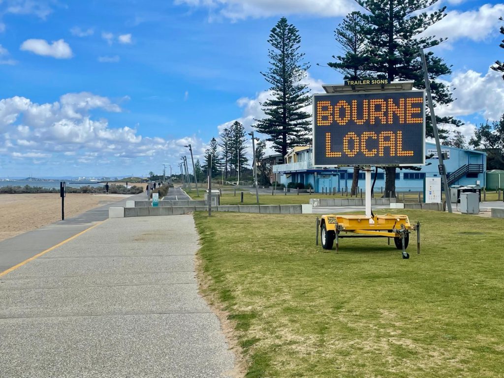 Amber VMS LED sign advertising 'Bourne Local' in Elwood Melbourne